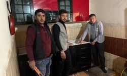 Patnos’ta ihtiyaç sahibi iki ailenin mutfak dolabı ihtiyacı karşılandı